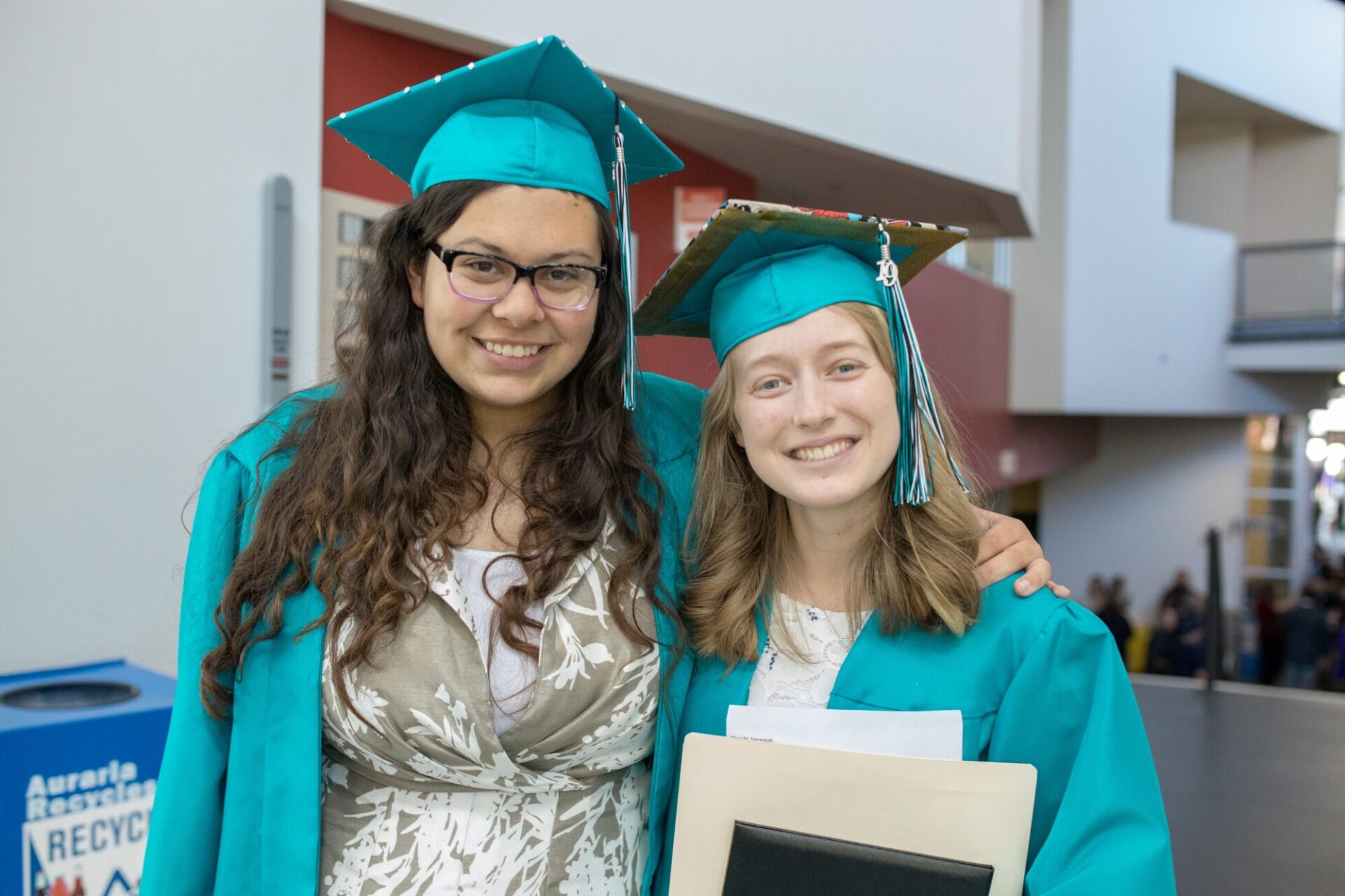 Graduate students smiling at the camera